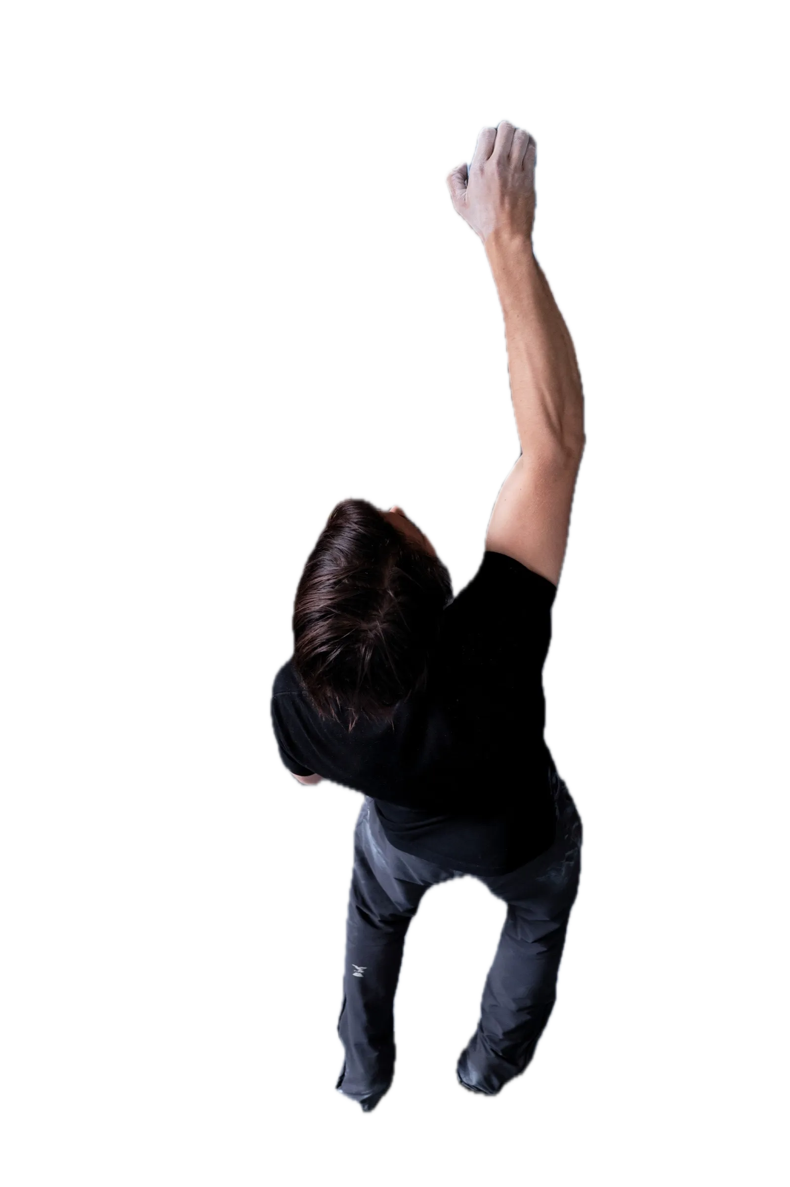 Climber standing on the force plate, gripping the hangboard